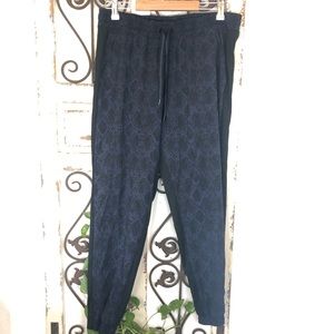 Athleta blue and black snake print joggers